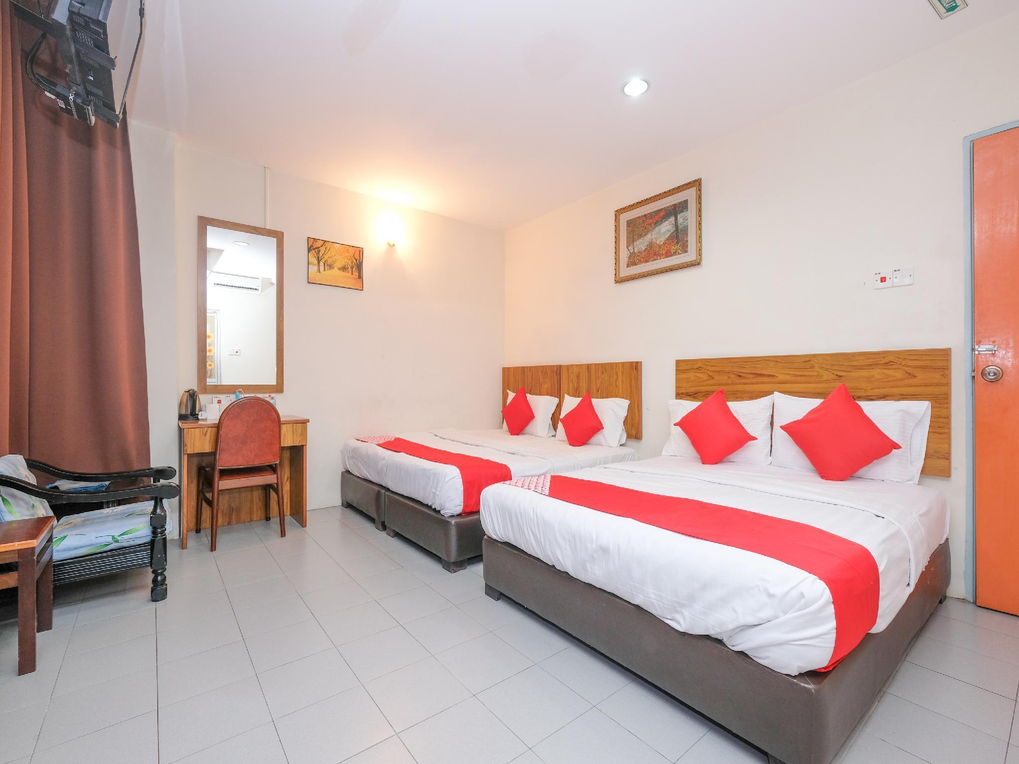 Oyo 89877 Sun Triang Hotel Kampong Kerayong Exterior photo